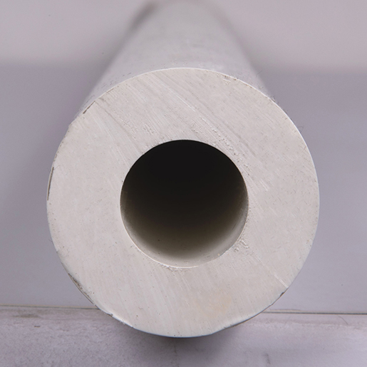 Dettaglio di Distanziale forato in PVC per fissaggi passanti Ø 45 mm 300