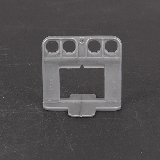 LIVELLATORE PIASTRELLE 1 MM 150PZ Dettaglio di LIVELLATORE PIASTRELLE 1 MM 150PZ 300